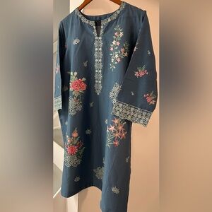 Pakistani two piece embroidered shirt and trouser.